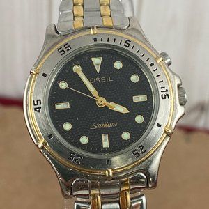 Vintage Fossil StarMaster Watch Gold Silver Black Face Luminous Hands
